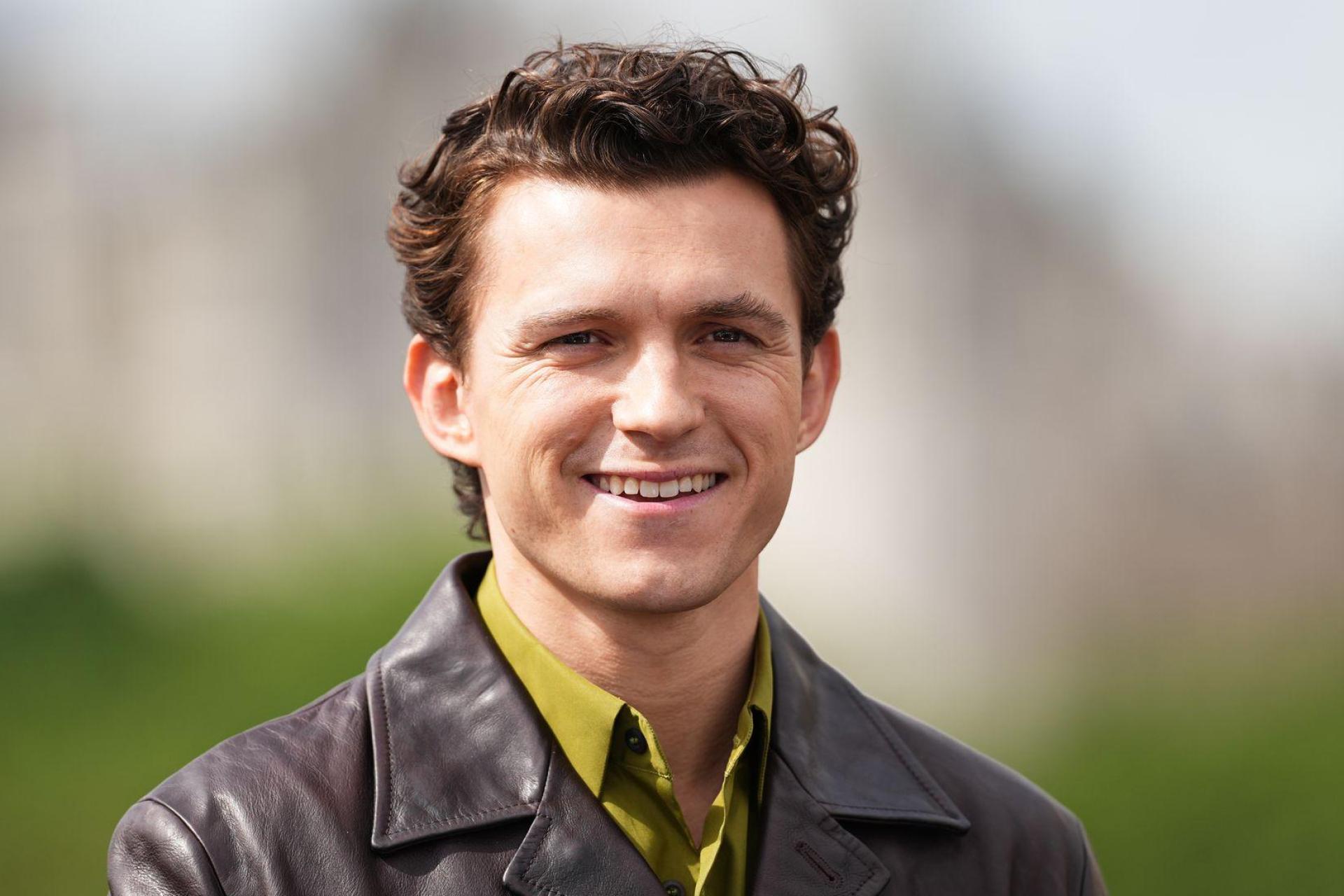 Der britische Schauspieler Tom Holland ist aktuell ein viel gesehenes Gesicht auf der Kinoleinwand. (Archivbild) (Bild: Scott A Garfitt/Invision/AP/dpa)